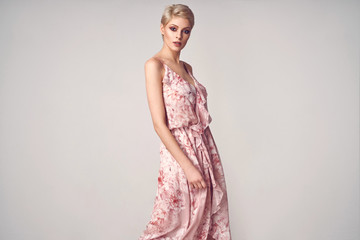 Fashion beautiful elegant woman posing in summer dress
