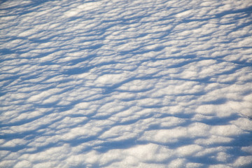 Natural winter background with snow drifts