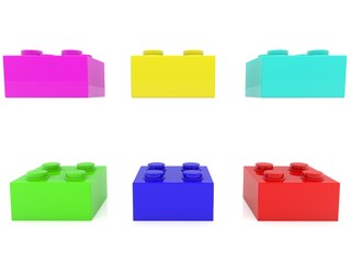 Six different colored toy bricks on a white background