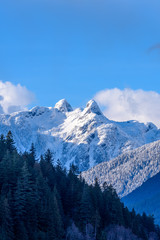 Fototapeta na wymiar Two Snow Mountains Vancouver British Columbia Pacific Northwest.