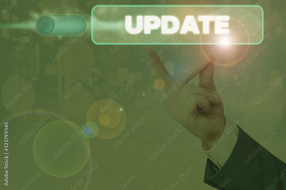 Wall mural conceptual hand writing showing update. concept meaning make something more modern adding new facts 
