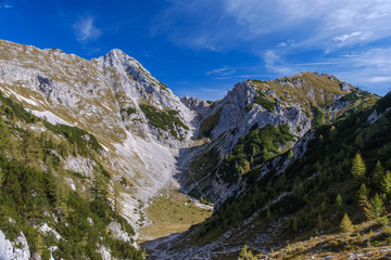 Fototapeta na wymiar View to beautiful valley and Mali Draski vrh in Slovenian alps