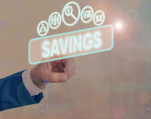 Conceptual hand writing showing Savings. Concept meaning the money that a demonstrating keeps in an...