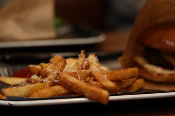 Fries and burger on a plate