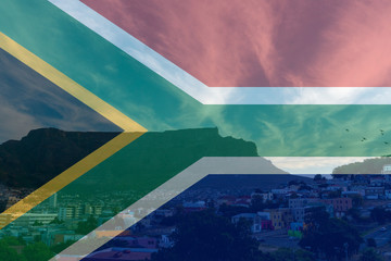 View of Table Mountain from Bo-Kaap or Malay in background with South African flag superimposed.