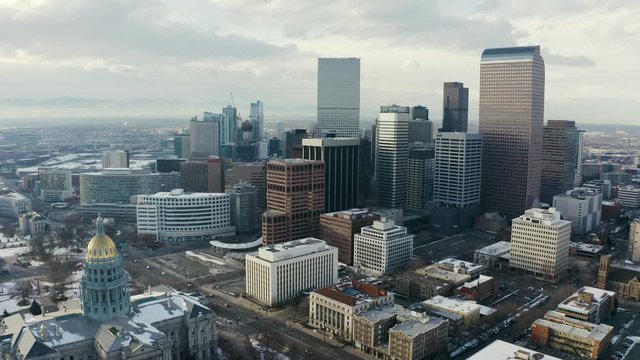 4k Aerial drone footage - Colorado State Capitol Building & the Skyline of the City of Denver Colorado at Sunset.  