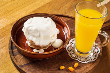 tasty pancakes with sour cream and tea