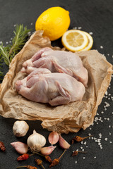 Raw quail meat on kitchen, cooking gourmet bird. Healthy diet recipe.
