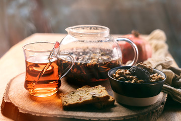 a herbal tea in winter, walnuts with prunes