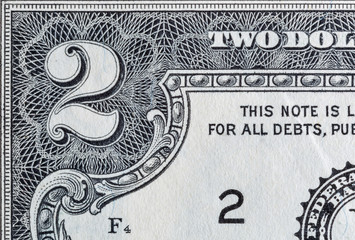 Corner of US two dollar bill macro.