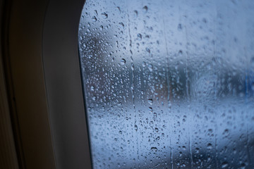 rainy window of a plane