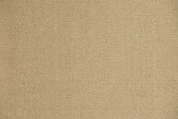 Fototapeta na wymiar canvas fabric in ochre tones for background