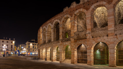 Fototapeta premium Verona, Italy. Night view of Piazza Bra with the historic arena of Verona, Roman amphitheater in the historic center and symbol of the city