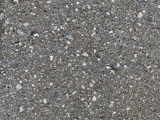 Textured, rocky grey concrete background. Industrial, grunge, rustic or urban effect. 