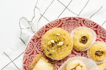 Baklava sweet dessert. Pastry made of layers of filo filled with chopped nuts and sweetened and...