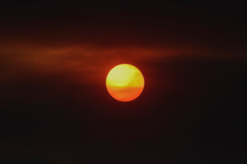 Orange sunset with clouds.