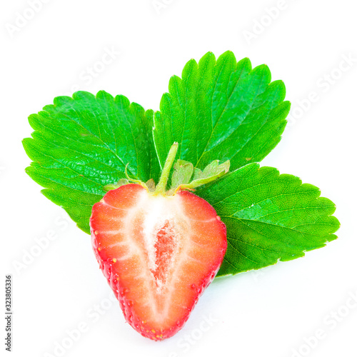 Single Half Cut Strawberry And Leaves Isolated On A White Wall Mural Trongnguyen