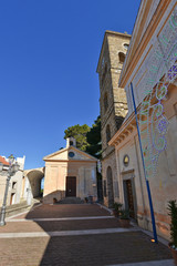 Fototapeta premium A narrow street between the old houses of a medieval village