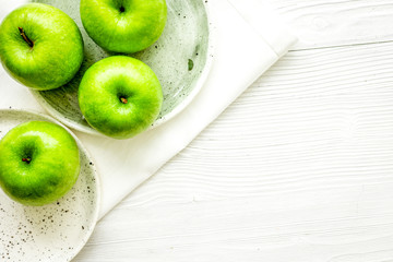 green apples for healthy dessert on white background top view mockup