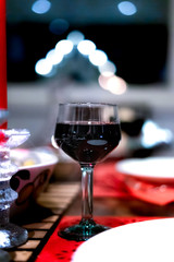 glasses of red wine on table in restaurant