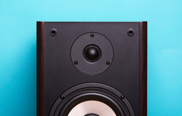 single speaker, speaker system, yellow background