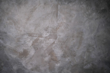 Dark grey artistic canvas backdrop with textured stains.