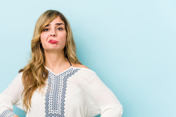 Young blonde caucasian woman sad, serious face, feeling miserable and displeased.