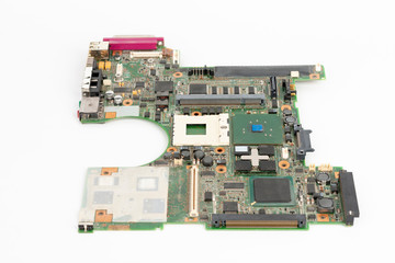Laptop mother board with empty socket for CPU a integrated graphics card on white background