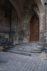 Obraz premium Ancient wood doorway in Prague's castle
