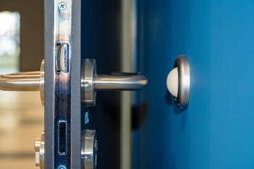 Door stoper on the blue wall