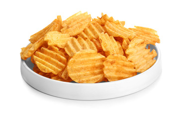 Plate with tasty potato chips on white background