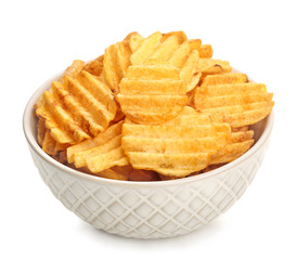 Bowl with tasty potato chips on white background