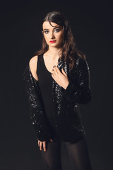 Beautiful fashionable woman on dark background