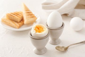 Tasty boiled eggs on table