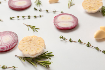 Spices and herbs on white background