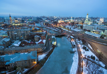 Fototapeta premium Winter evening aerial view to downtown and river in Kharkiv