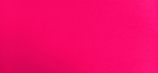 Pink beautiful or fuchsia bright background. Scarlet, purple uneven color. Sheet of colored paper