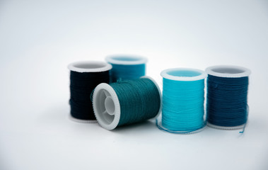 Roll of thread put on white background,show texture,for needle work