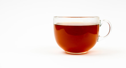 Glass cup of black tea. Isolated on white background