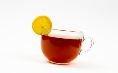 tea in cup with leaf mint and lemon isolated on white background