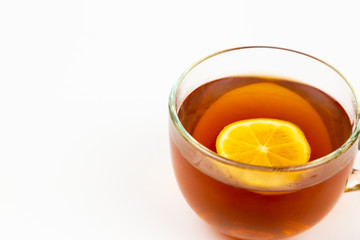 tea in cup with leaf mint and lemon isolated on white background