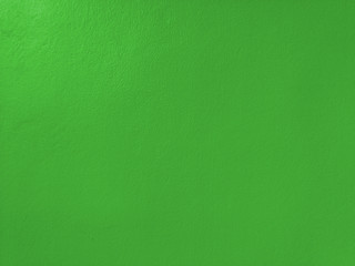 Concrete  green  wall  background  with  copy  space.