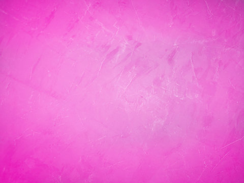 Concrete  pink  wall  background  with  copy  space.