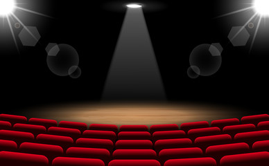 Obraz premium chairs and stage with spotlight in the hall 