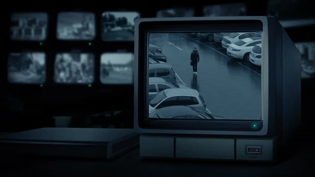CCTV Showing People Walking In Car Parking Area