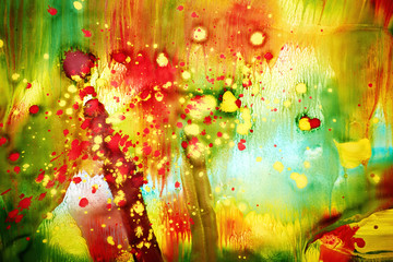 Abstract painting painted with rich colorful paints. Bright rainbow colors. Gouache and acrylic paints. Abstract background texture