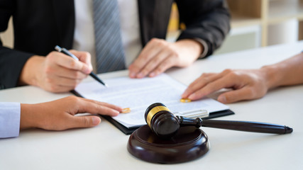 Couple husband and wife during divorce process listening to lawyer dissolves marriage contract,...