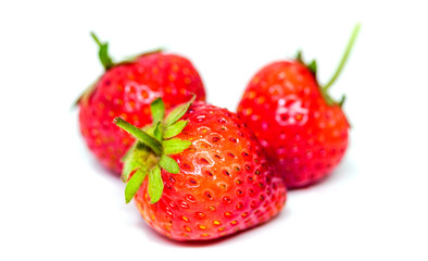 Fresh red strawberries on a white background