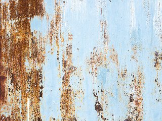 Fototapeta premium The blue metal sheet surface has rust stains.