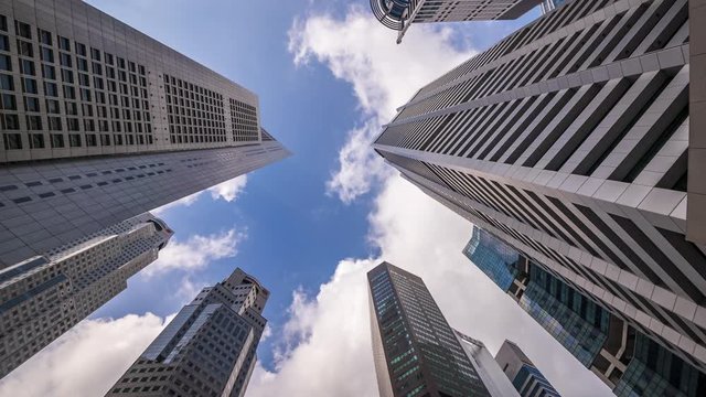4k Time lapse upper view of business and financial skyscraper buildings in Singapore.